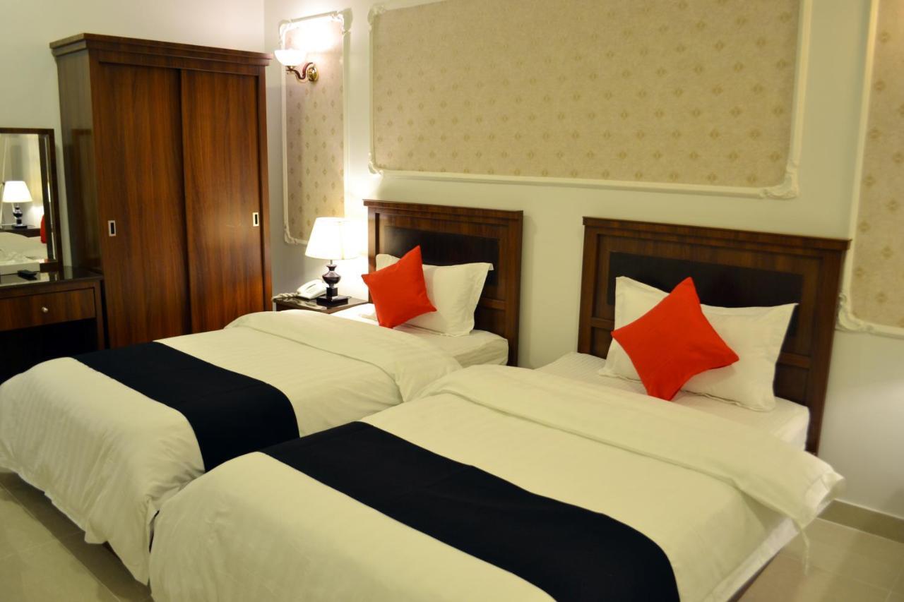 Gelnar Al Raqi Aparthotel Sultanah Exterior foto